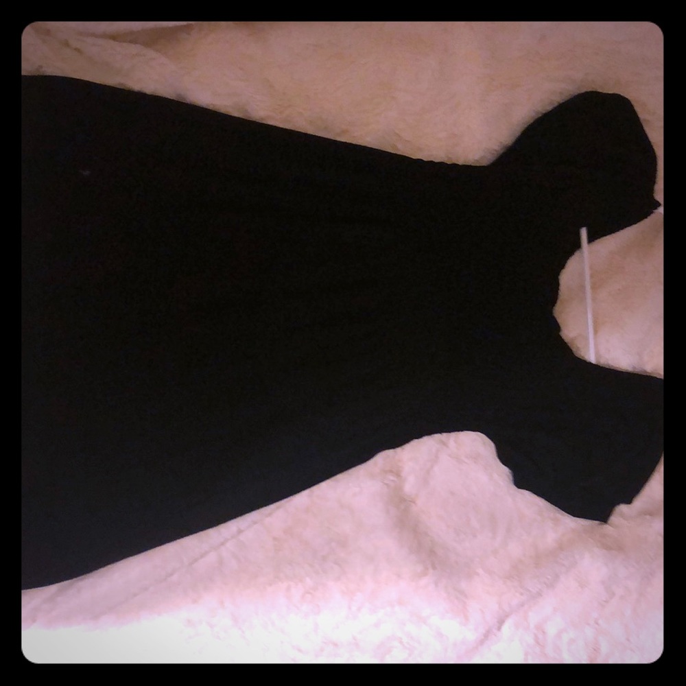 Just a black dress that fits you around the waste